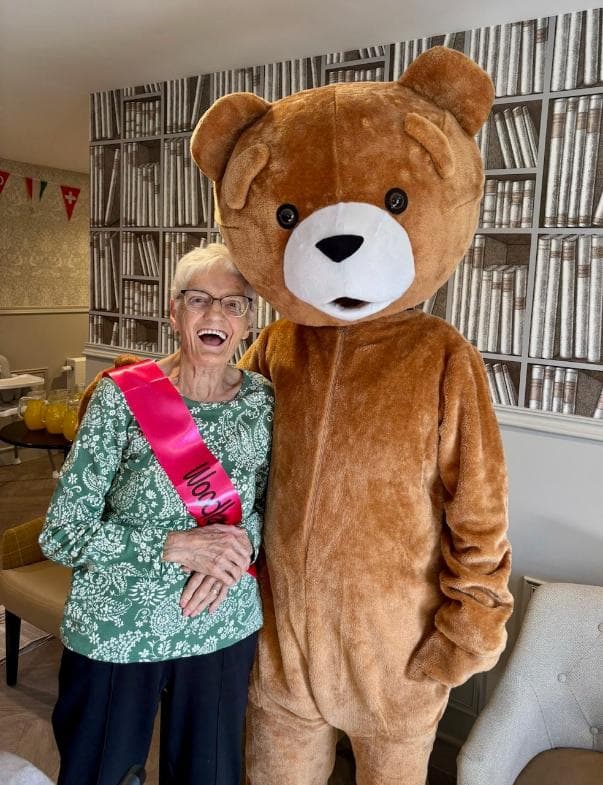 resident-with-mascot