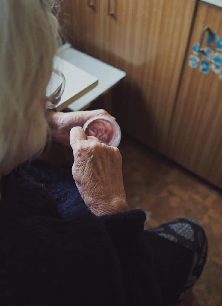 old-woman-eating-a-yoghurt