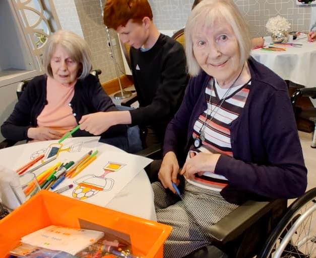 woodlands residents making scottish cup banners